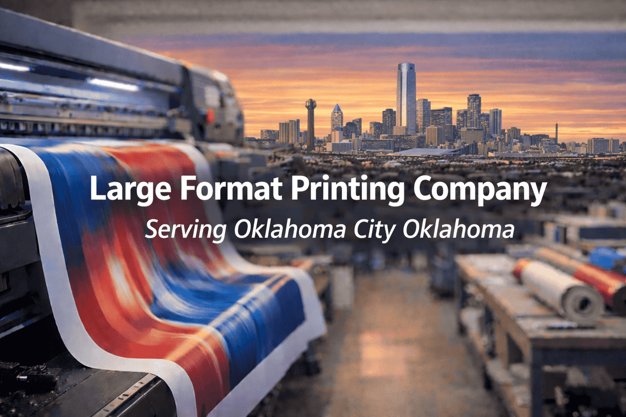 A large digital printer produces a colorful print in a workshop. The background shows the Oklahoma City skyline at sunset, with 