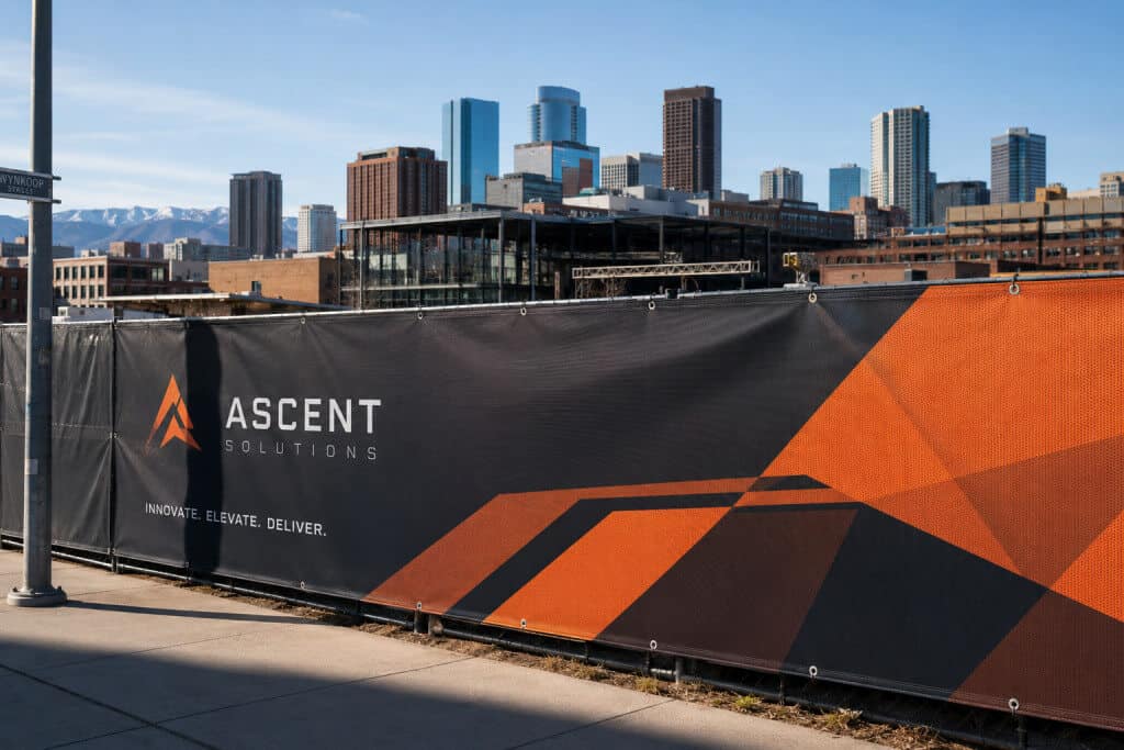 Large-format banner with Denver skyline and Rocky Mountains