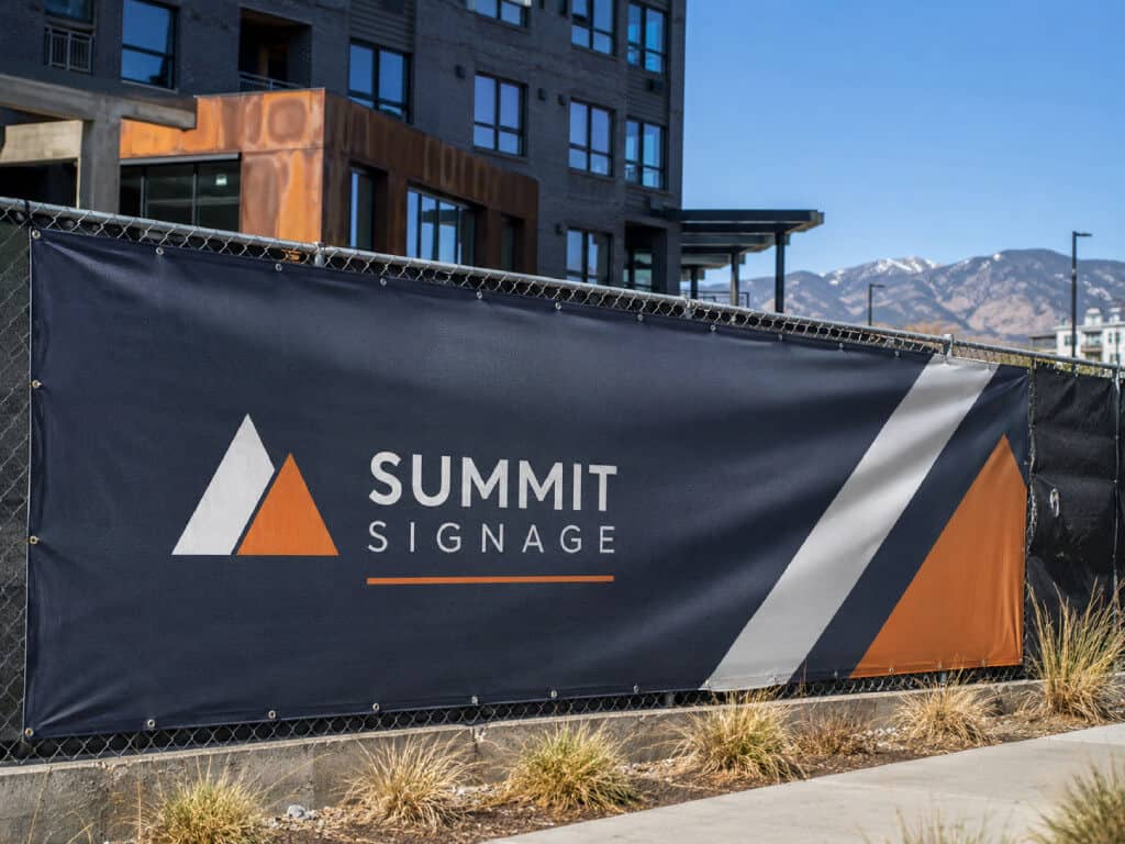 Vinyl banner installed on a Denver construction fence