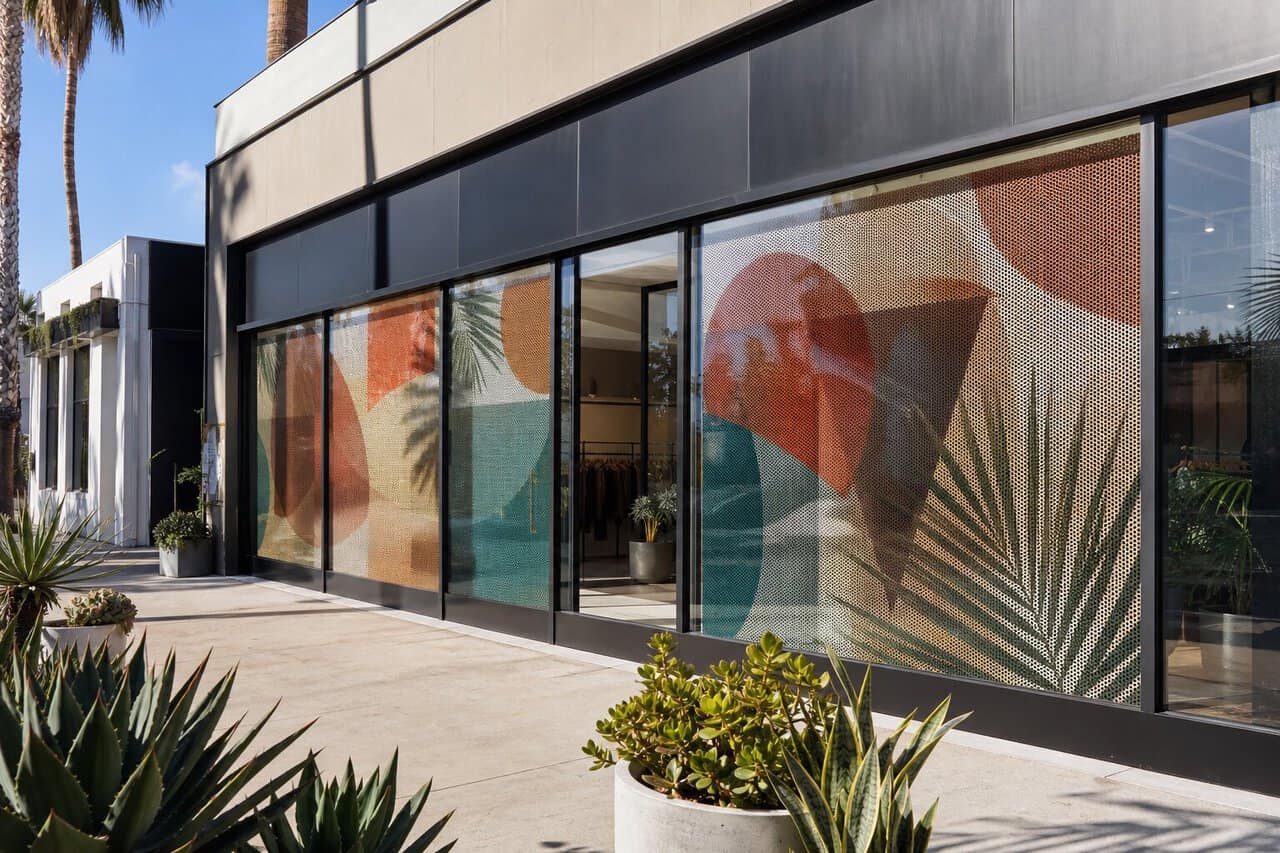 Colorful perforated graphics covering a modern Los Angeles storefront.